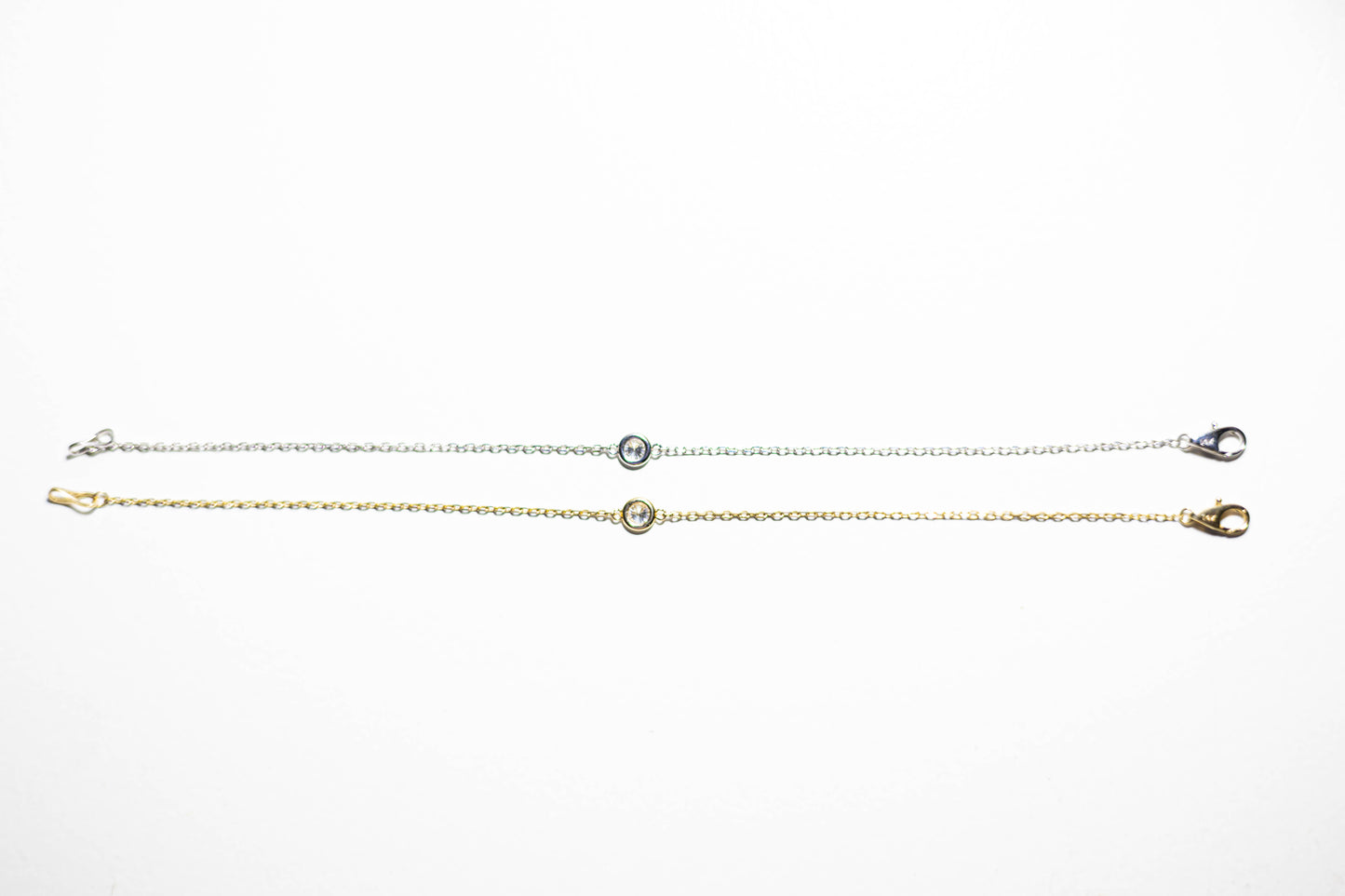 Pair of single diamond bracelets in 14K solid white gold and yellow gold