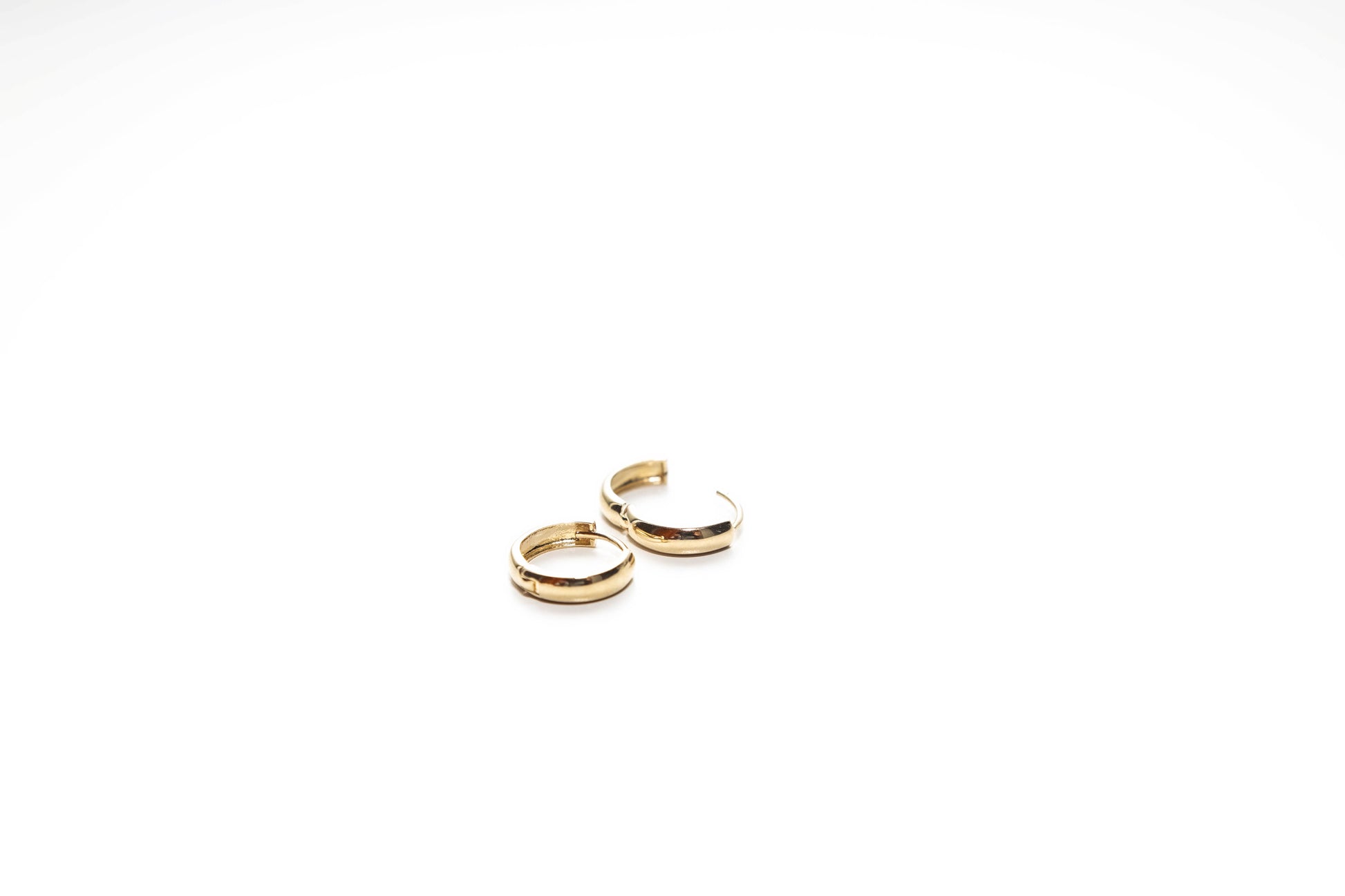 14K mini gold round huggies